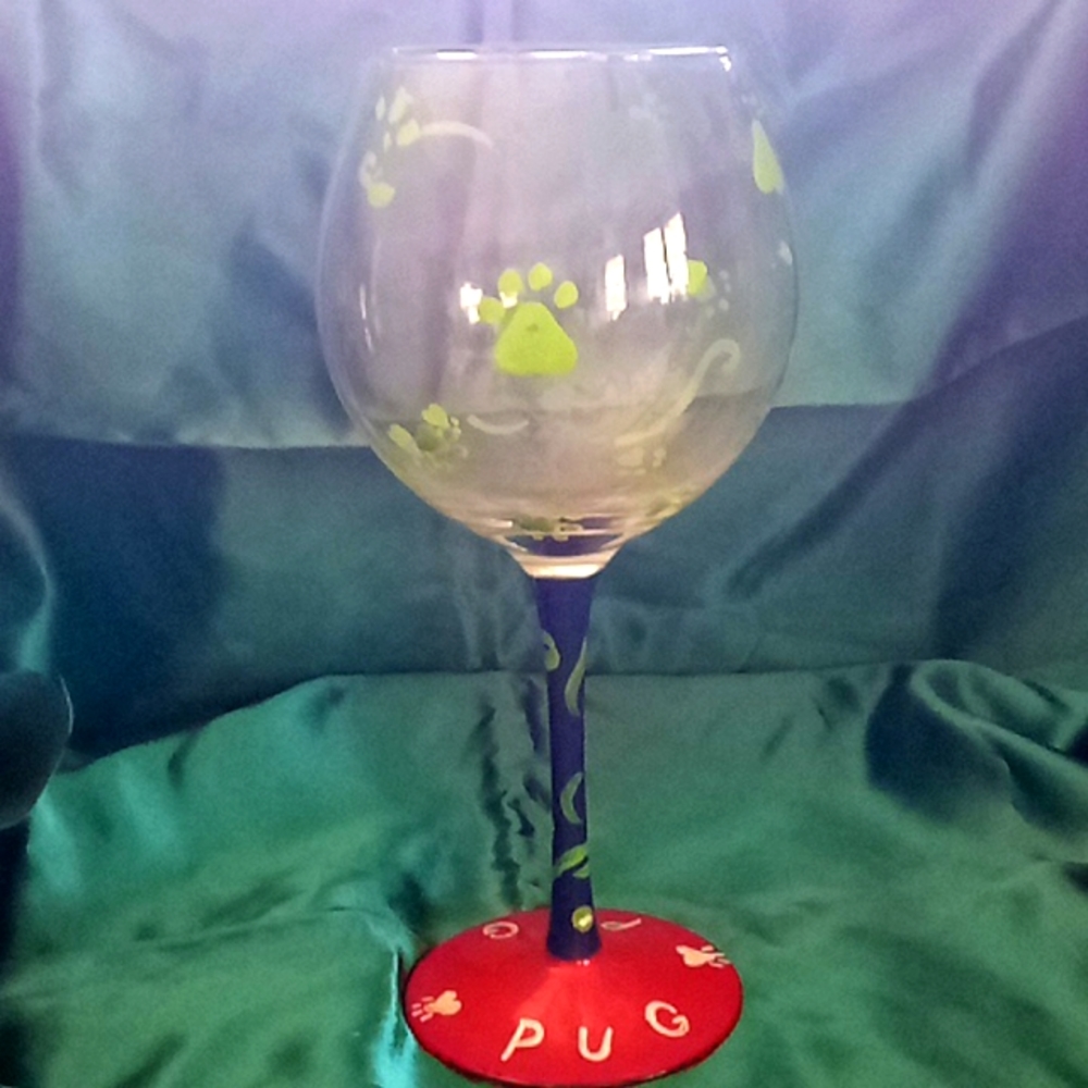 Very unusual wine glass from a pug lover I am guessing
